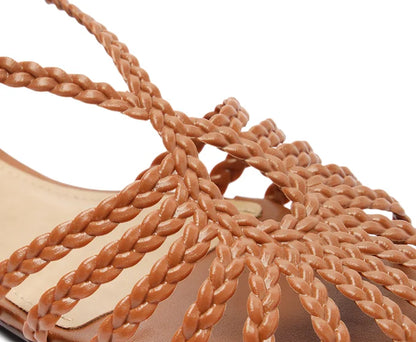 Flat sandal with braided straps, teardrop shape, brown.